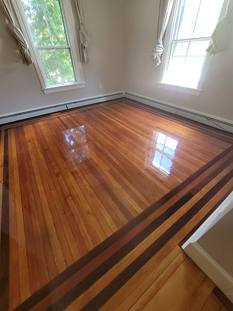 Dark brown polished hardwood flooring
